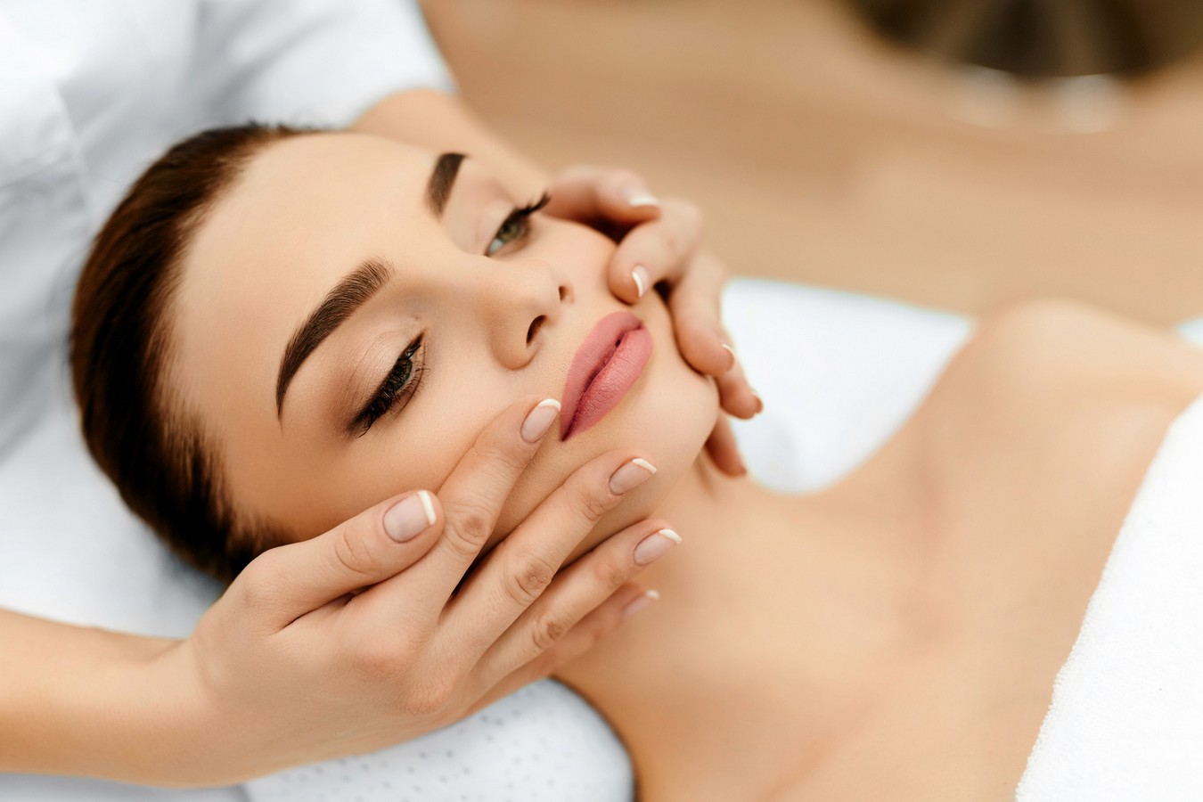 Skin, Body Care. Woman Getting Beauty Spa Face Massage. Treatmen